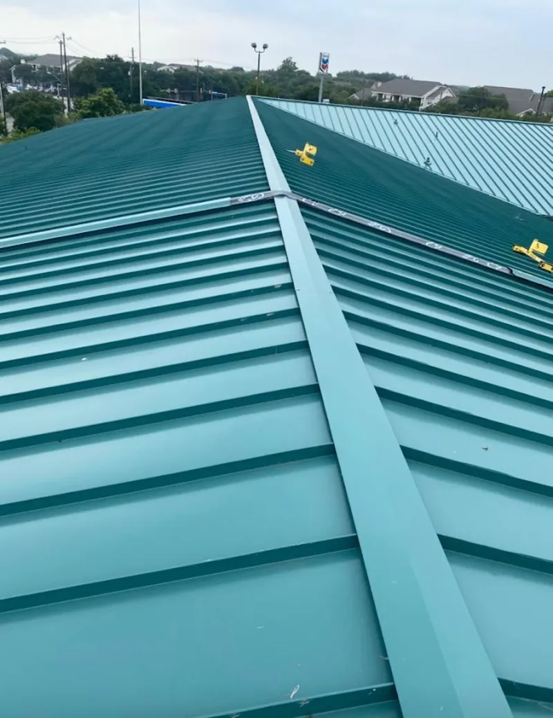 Green commercial metal roof ridge and valley for Metal Roof Repair in New Brunswick