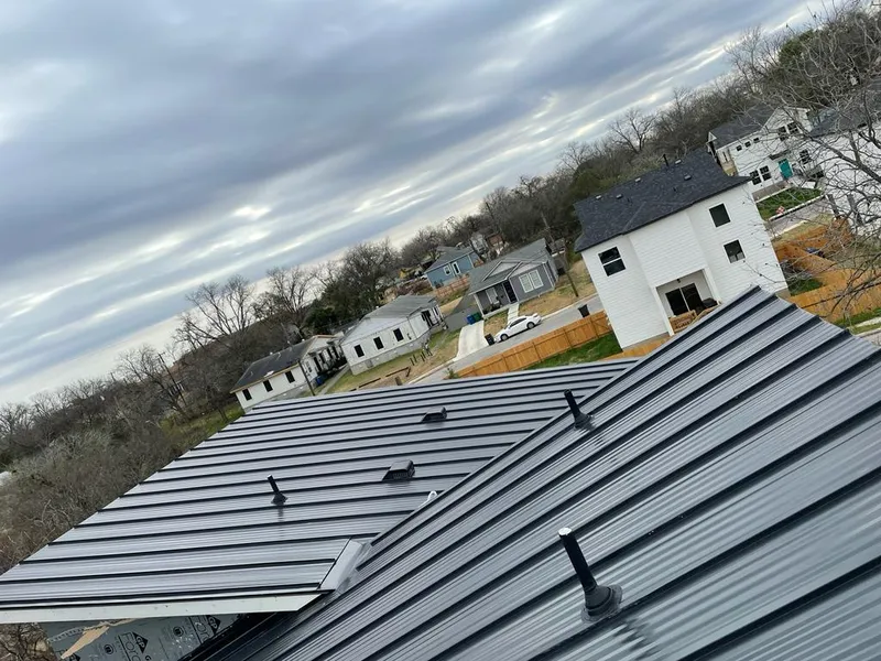 Standing seam metal roof panels with vents for Skylight Repair in New Brunswick